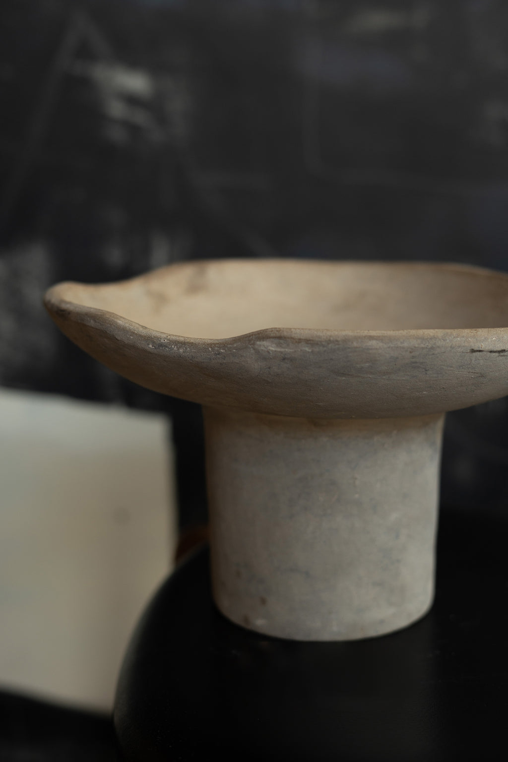 Terracotta pedestal bowl with a tall foot