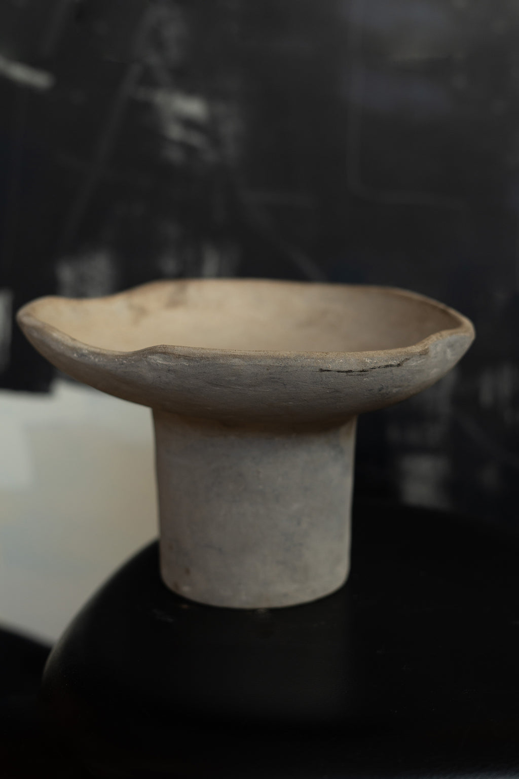 Terracotta pedestal bowl with a tall foot